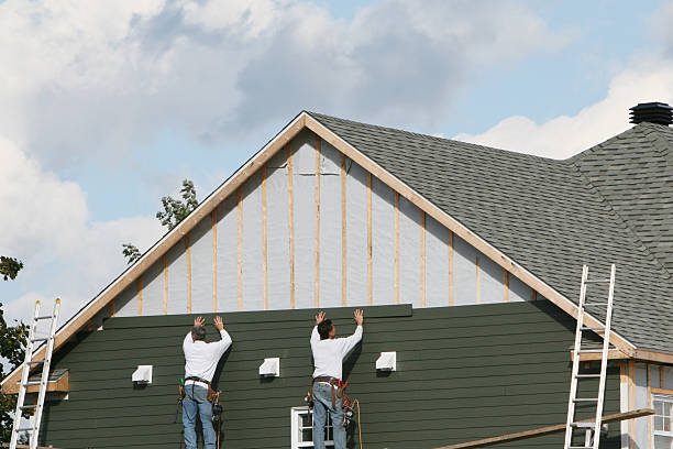 Professional Storm Damage Siding Repair technician working in Murrysville, PA